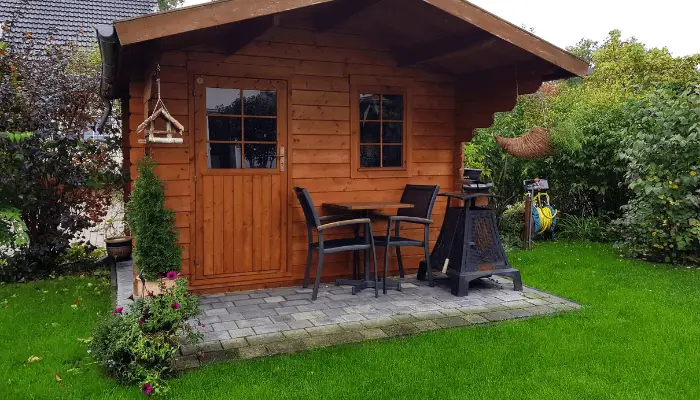 A garden shed sitting on a foundation