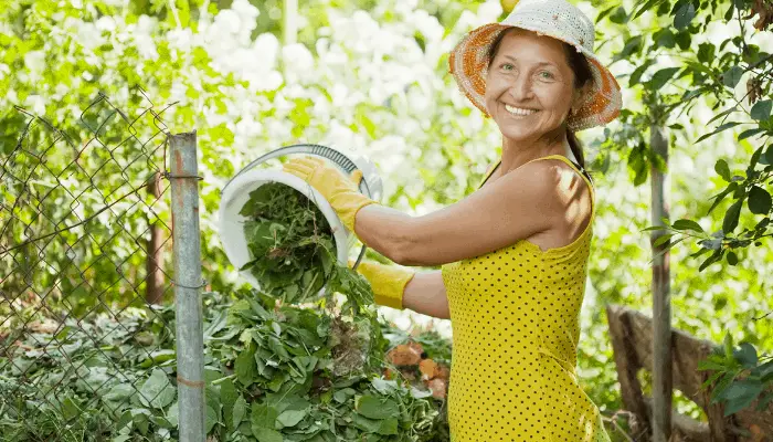 a lady composting in the sun